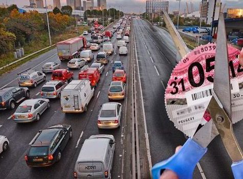 car tax disc cut up on motorway bridge
